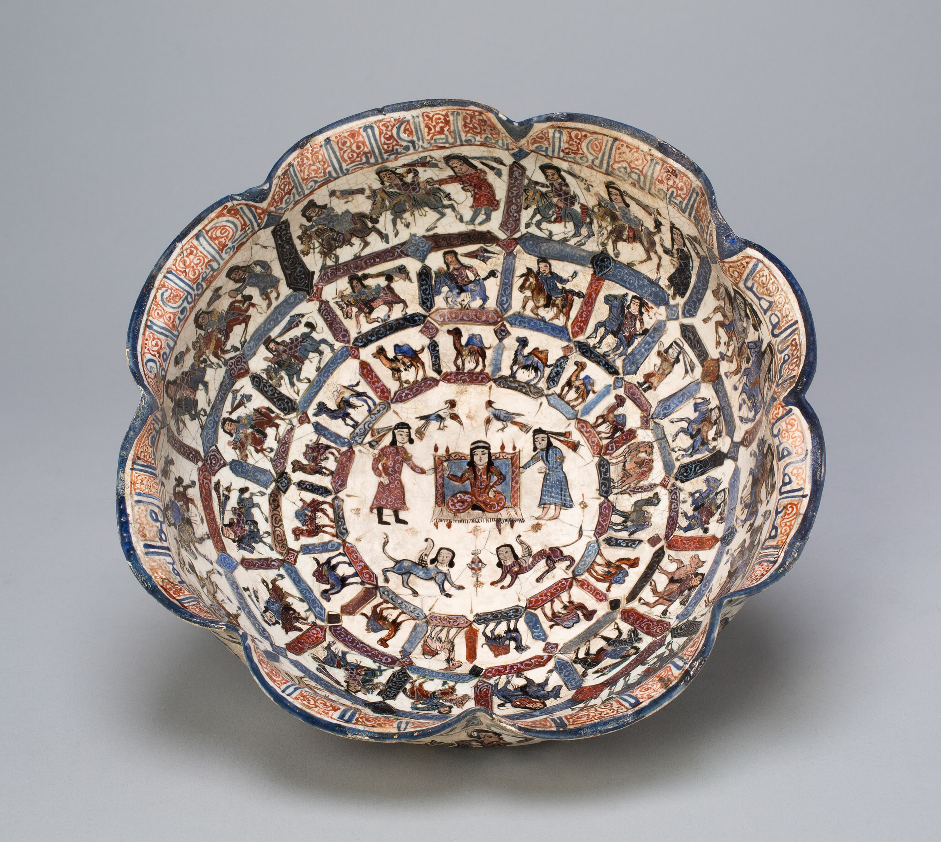 Lobed Bowl with Seated Figure and Attendants, Seljuq dynasty (ca. late 12th-early 13th century), Iran, probably Kashan.jpg