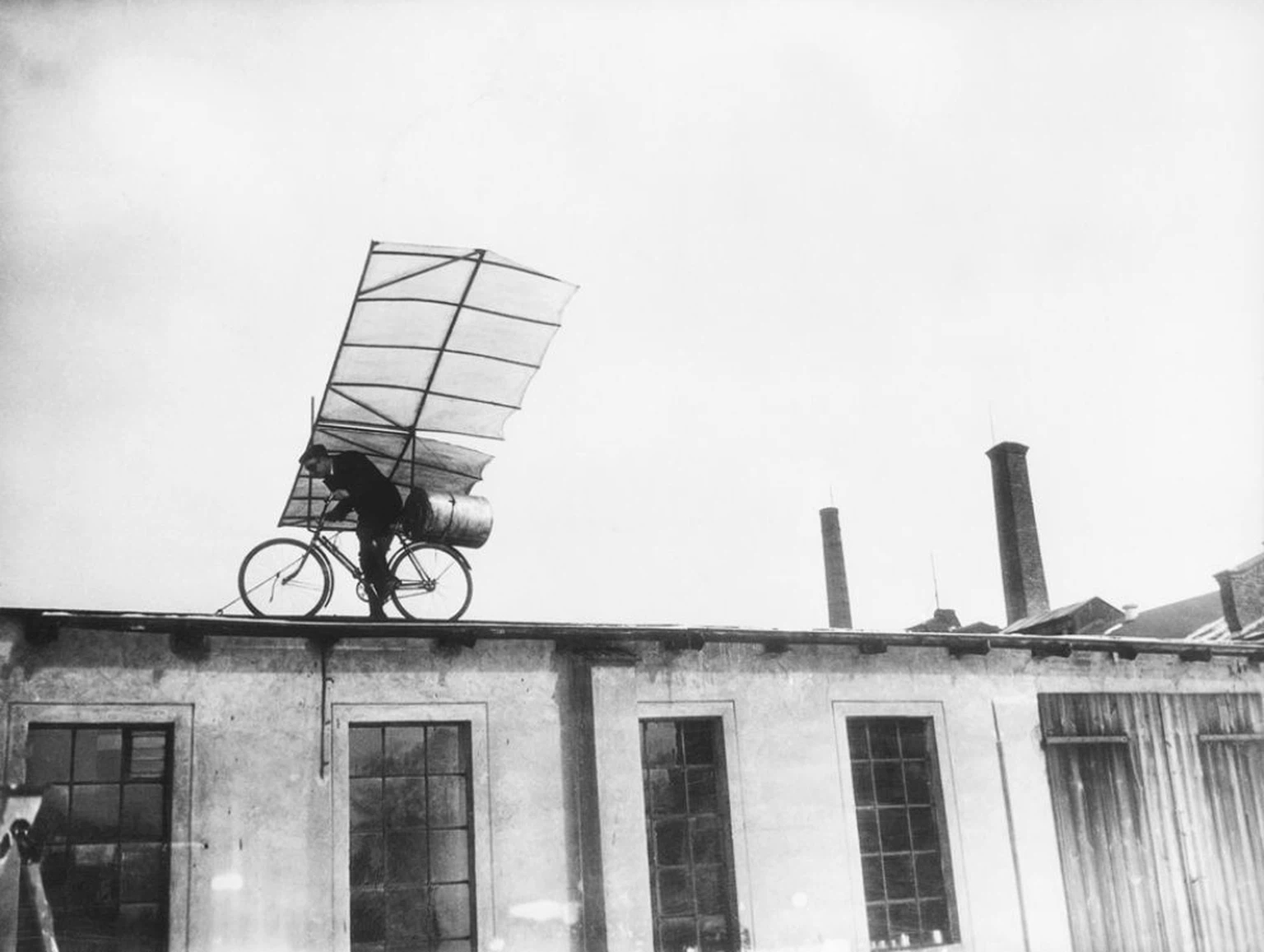 Max Wiedenhoft posing on the roof with his newly designed rocket-bicycle, 1932.jpg