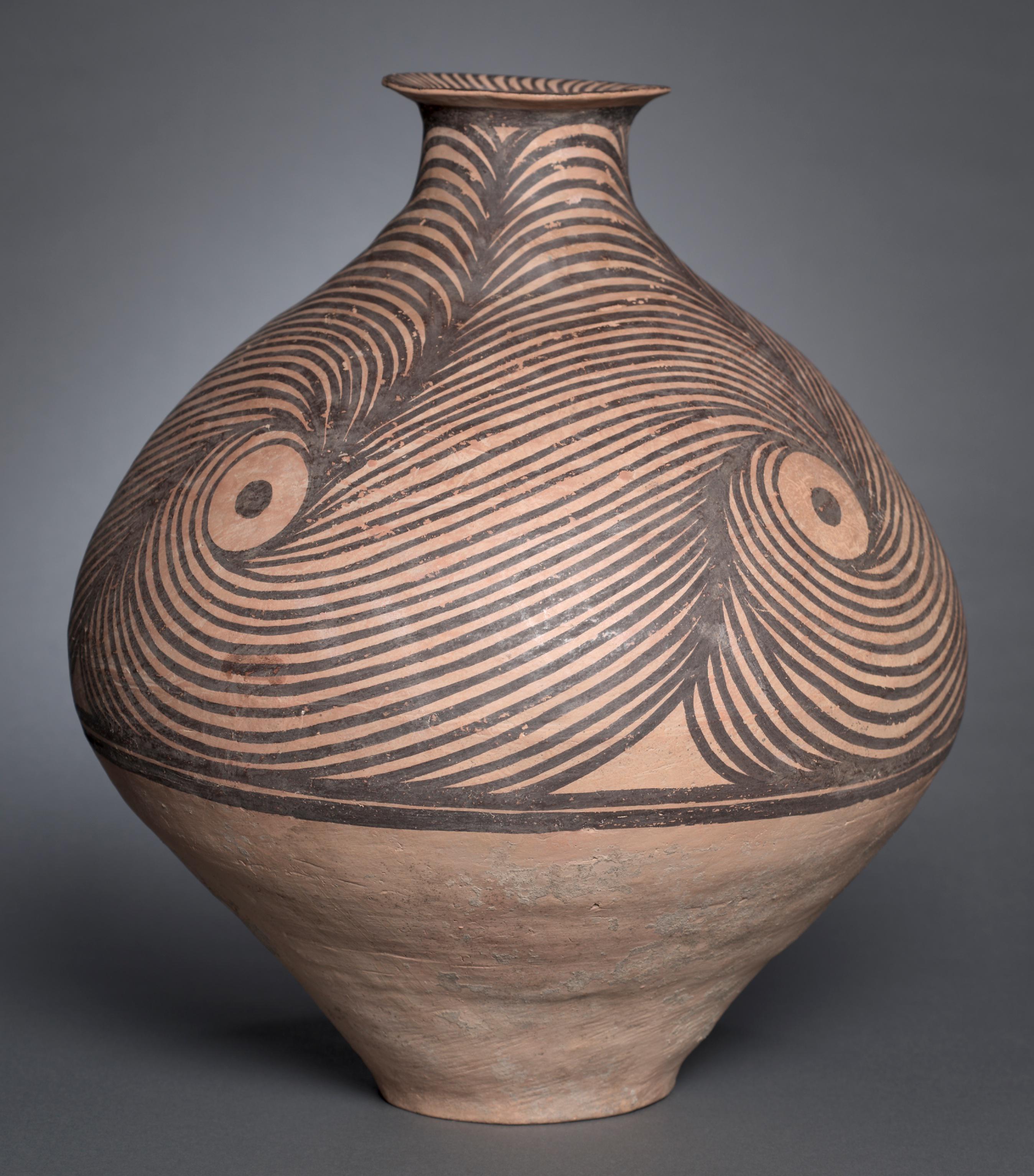 A jar with spiral designs from China. Majiayao culture, 3300-2650 BCE, now on display at the Cleveland museum of art.jpg