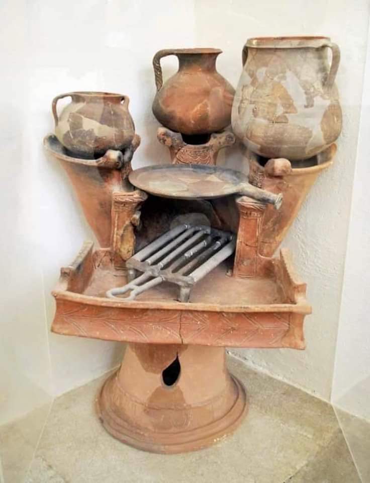 A 2,500 year old ancient Greek 'cooker' - three (or four) stoves, oven and a grill. Found on the Greek island of Delos.jpg