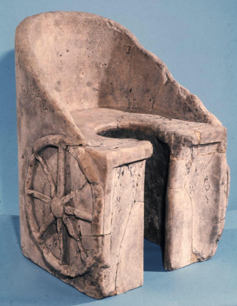 Marble toilet with carved chariot wheels from the baths of Caracalla in Rome, Circa 215 AD.jpg