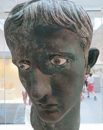 The Meroë Head is a larger-than-life-size bronze head depicting the first Roman emperor Augustus (r. 27 BCE-14 CE), that was found in the ancient Nubian site of Meroë in modern-day Sudan in 1910. Now on display at the British Museum.jpg