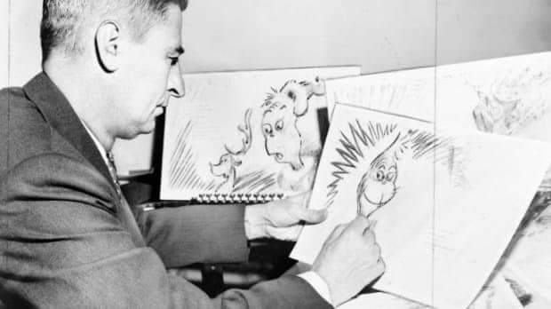 Theodor Seuss Geisel (aka Dr. Seuss), working on a sketch of The Grinch in the 1950s.jpg
