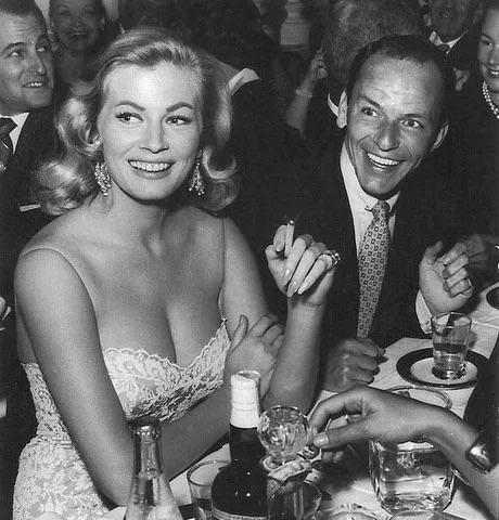 Frank Sinatra and Anita Ekberg at Romanoff's restaurant - 1955.jpg