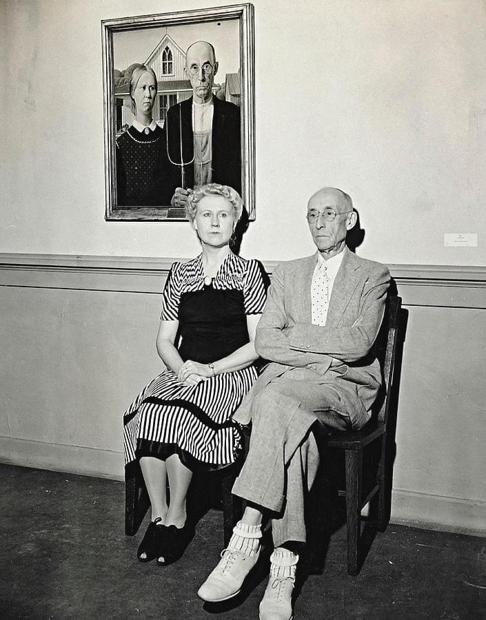 Nan Wood Graham and Dr. Byron McKeeby pictured in 1942 recreating their original poses for ‘American Gothic’. She was the painters sister, and he was their dentist.jpg