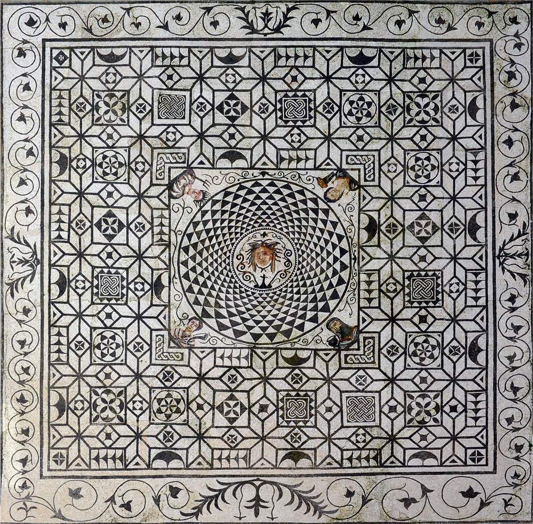 Roman mosaic found in a bath-house in Carmona, Spain. The head of Medusa is in the center.jpg
