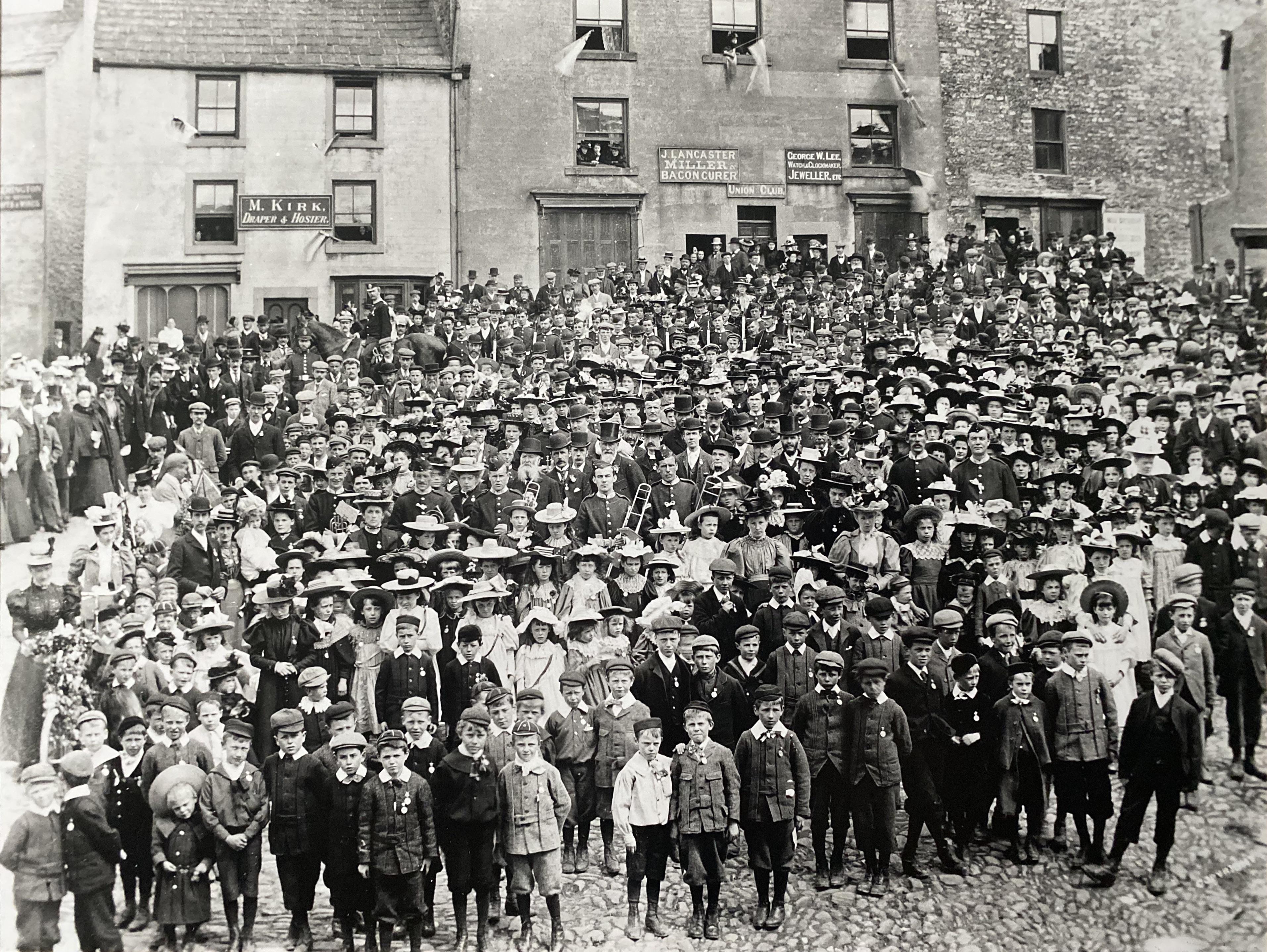 Local community photo (Cumbria, U.K) circa 1899.jpg