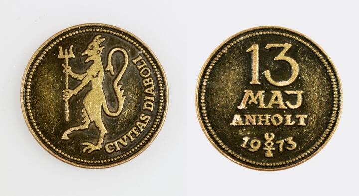 Through the 70's and up to today, satanic coins have been found in Danish Churches and abroad. They all speak of the 13th of May 1973, and the island of Anholt. On that day 13 satanic ritual sites were found on the island.jpg