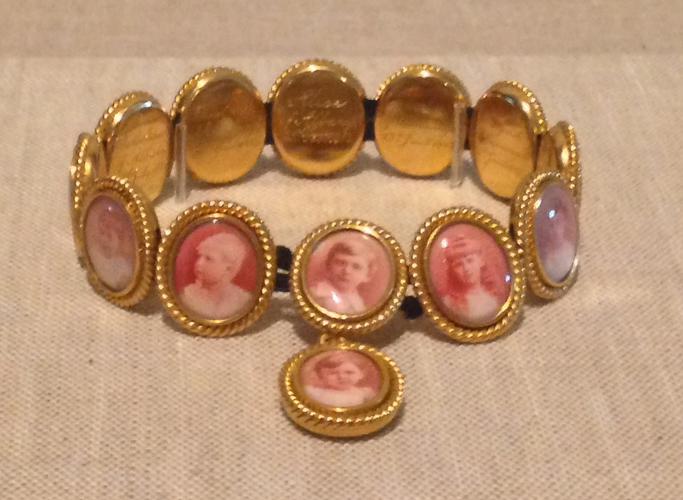 Queen Victoria's bracelet featuring 13 of her grandchildren, including the future Kaiser Wilhelm of Germany, King George V, Tsarina Alexandra Feodorovna, Queen Maud of Norway and Queen Victoria Eugénie of Spain - ca. 1870-1890.jpg