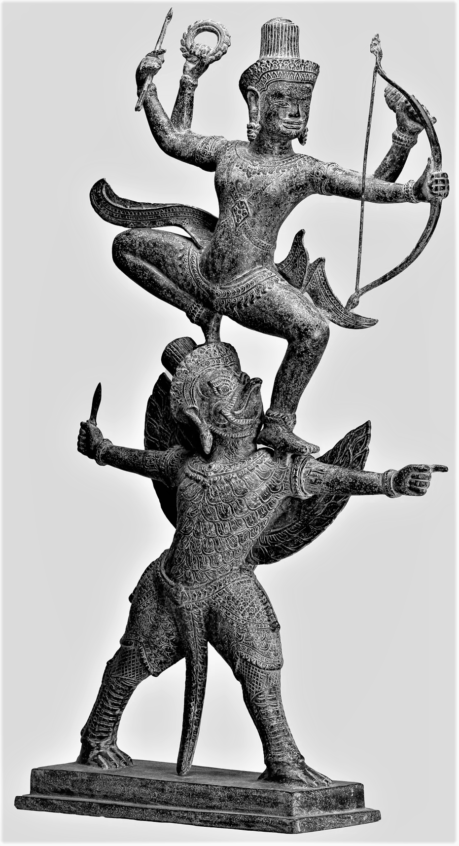 Khmer statue of Vishnu standing on top of Garuda in the midst of battle. Cambodia, 9ᵗʰ-13ᵗʰ Century CE.png