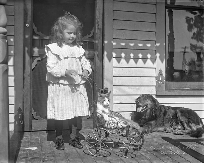 Cleveland, OH, circa early 1900s. This photo has it all. A cute kid, loyal dog and a cat who knows he’s the boss.jpg