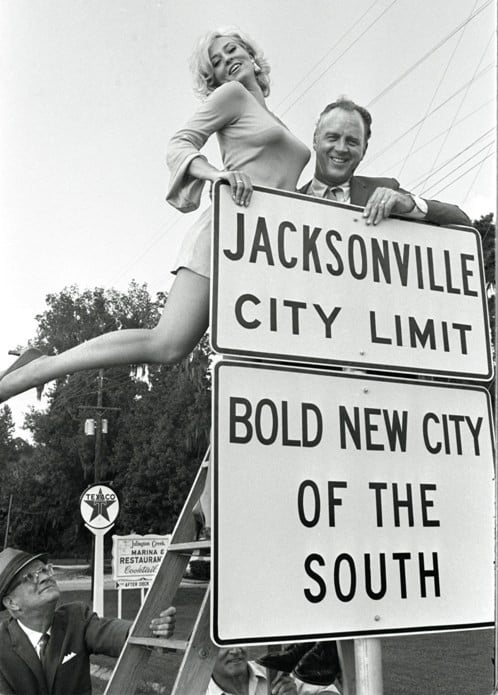 1968. Mayor Hans Tanzler and actress Lee Meredith installing a new Jacksonville City Limit sign.jpg