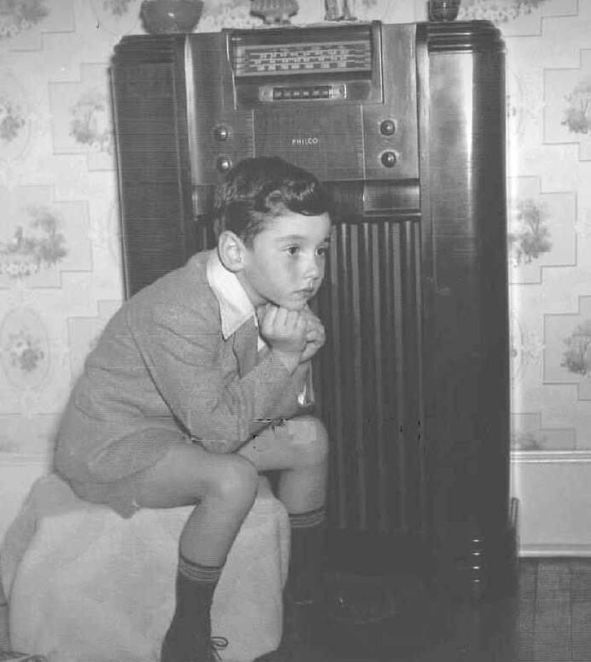 My grandpa listening to the radio. Circa 1940s.jpg