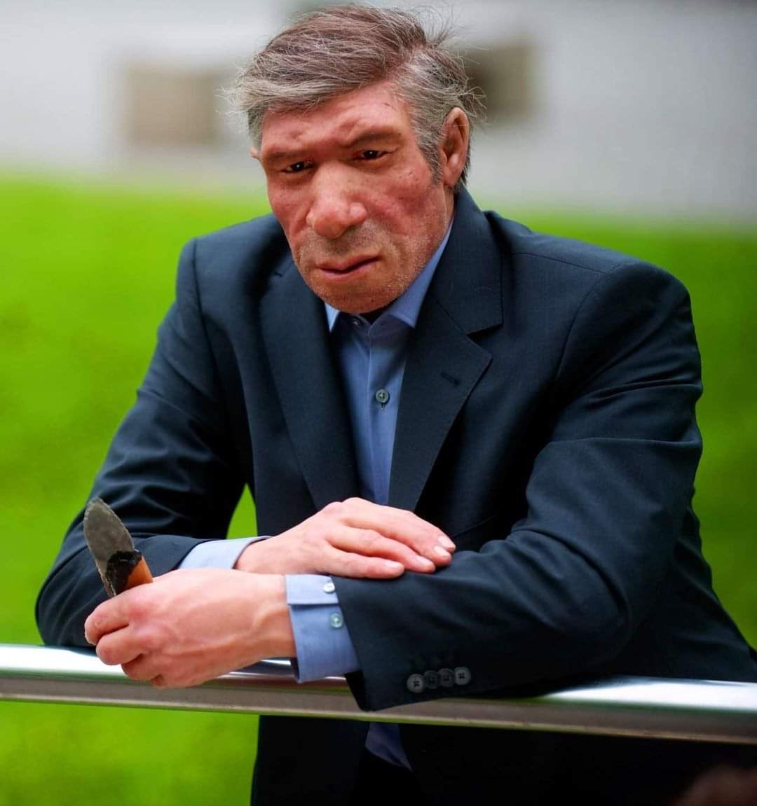 A model of a Neanderthal man in modern clothing; Stands in front of Neanderthal Museum in Mettmann, Germany.jpg