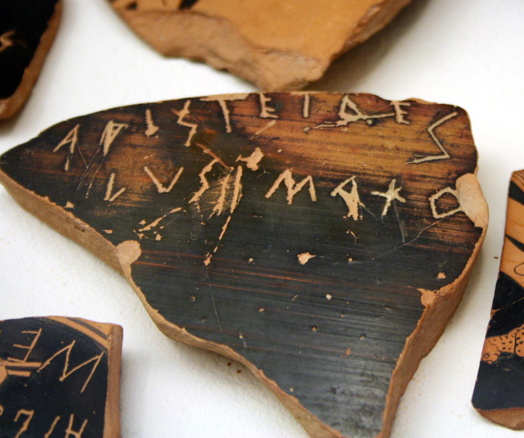 Early 5th century BC Athenian ostrakon (sherd of pottery inscribed with the name of a politician proposed for exile, the so-called ostracism) against Aristides. Found in River Eridanos.jpg