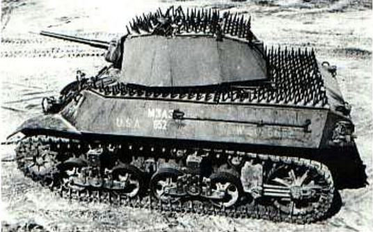 A Stuart tank with experimental spiked armor, the spikes were supposed to create a distance to the armor to reduce the effects of explosive charges as well as to prevent enemy troops from climbing on the tank.png