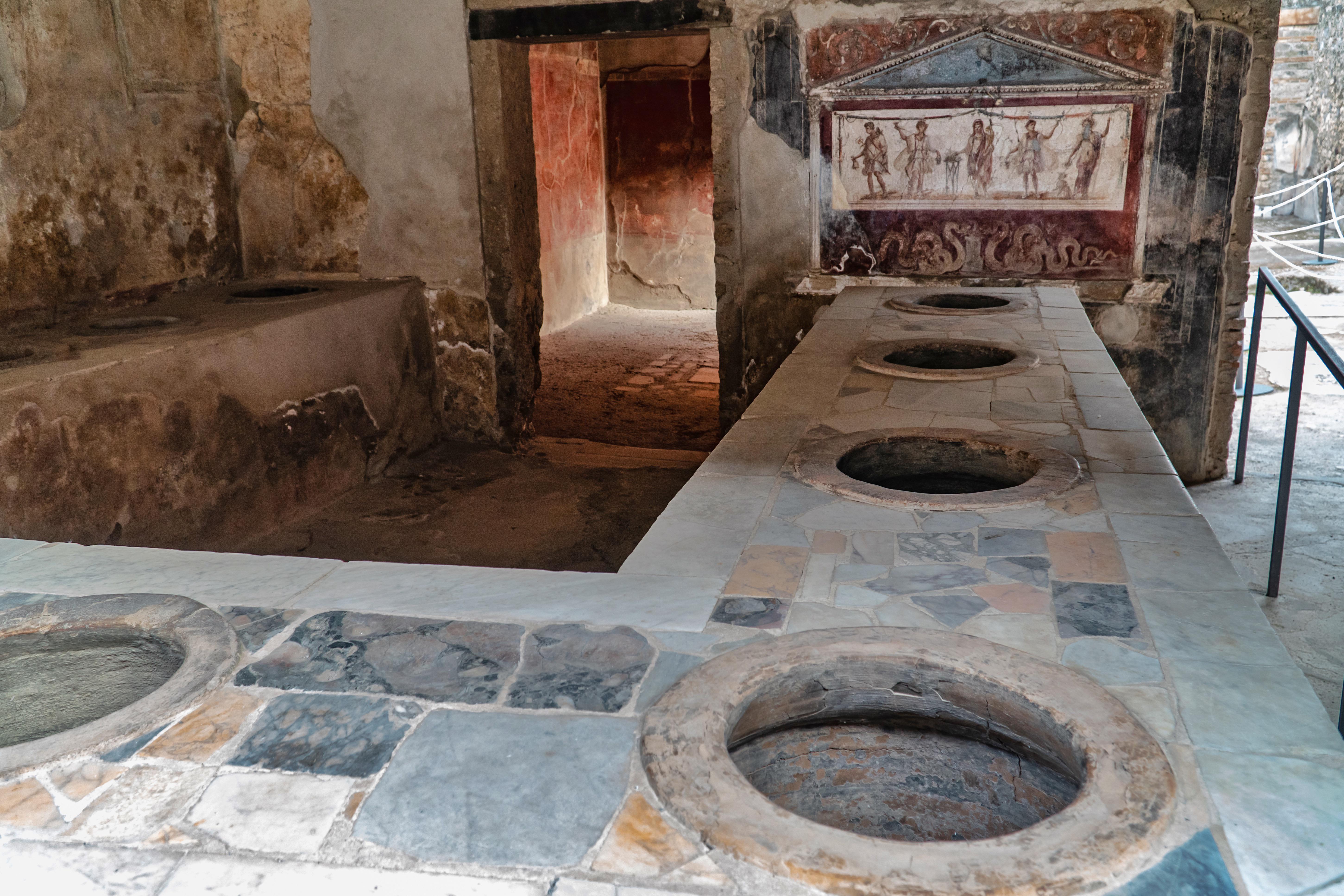 The owner of this Pompeii fast food restaurant stashed his earnings in a jar, likely before running off.jpg