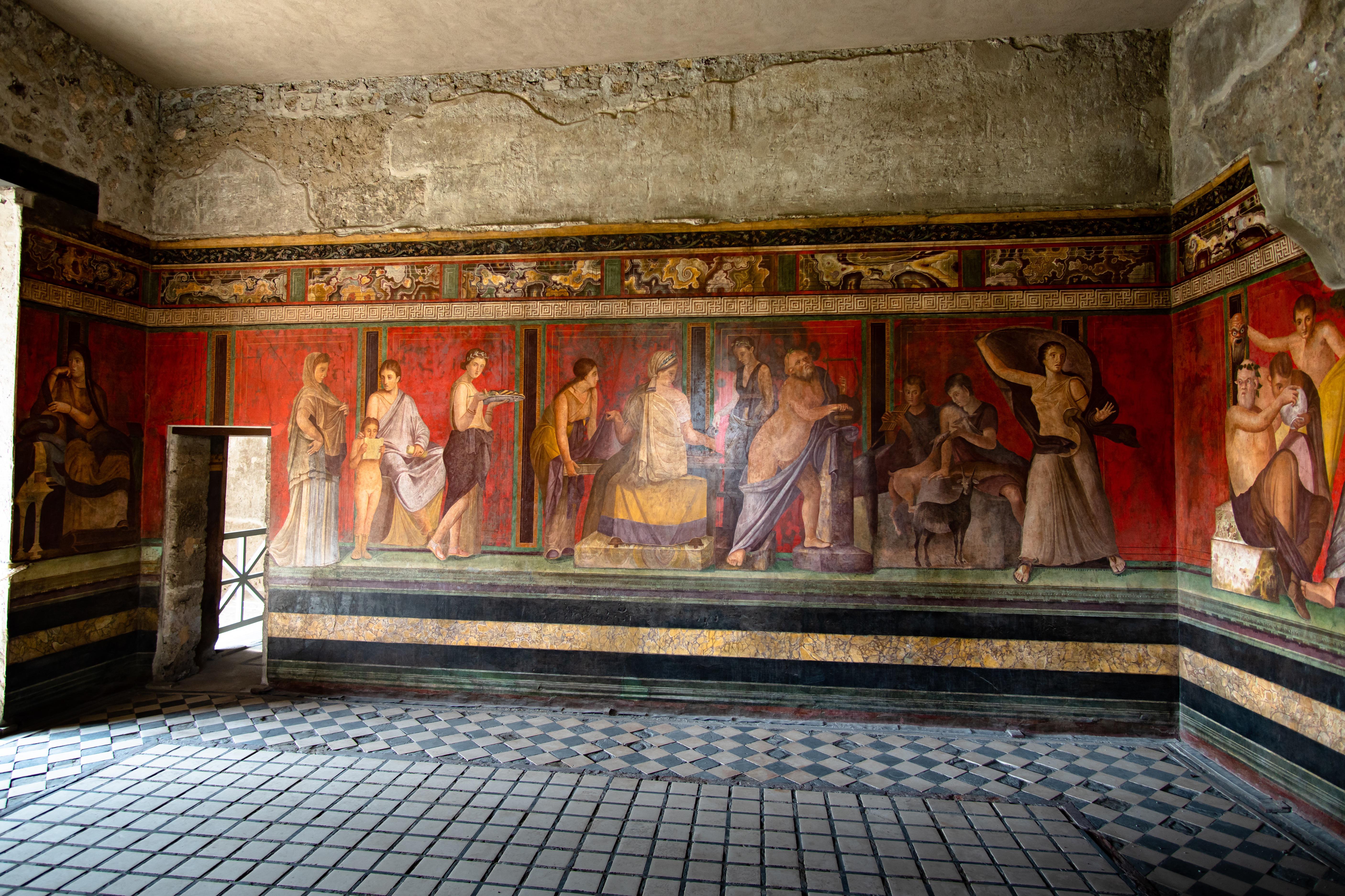 The Villa of the Mysteries in Pompeii, possibly showing part of an ancient wine-drinking cult.jpg