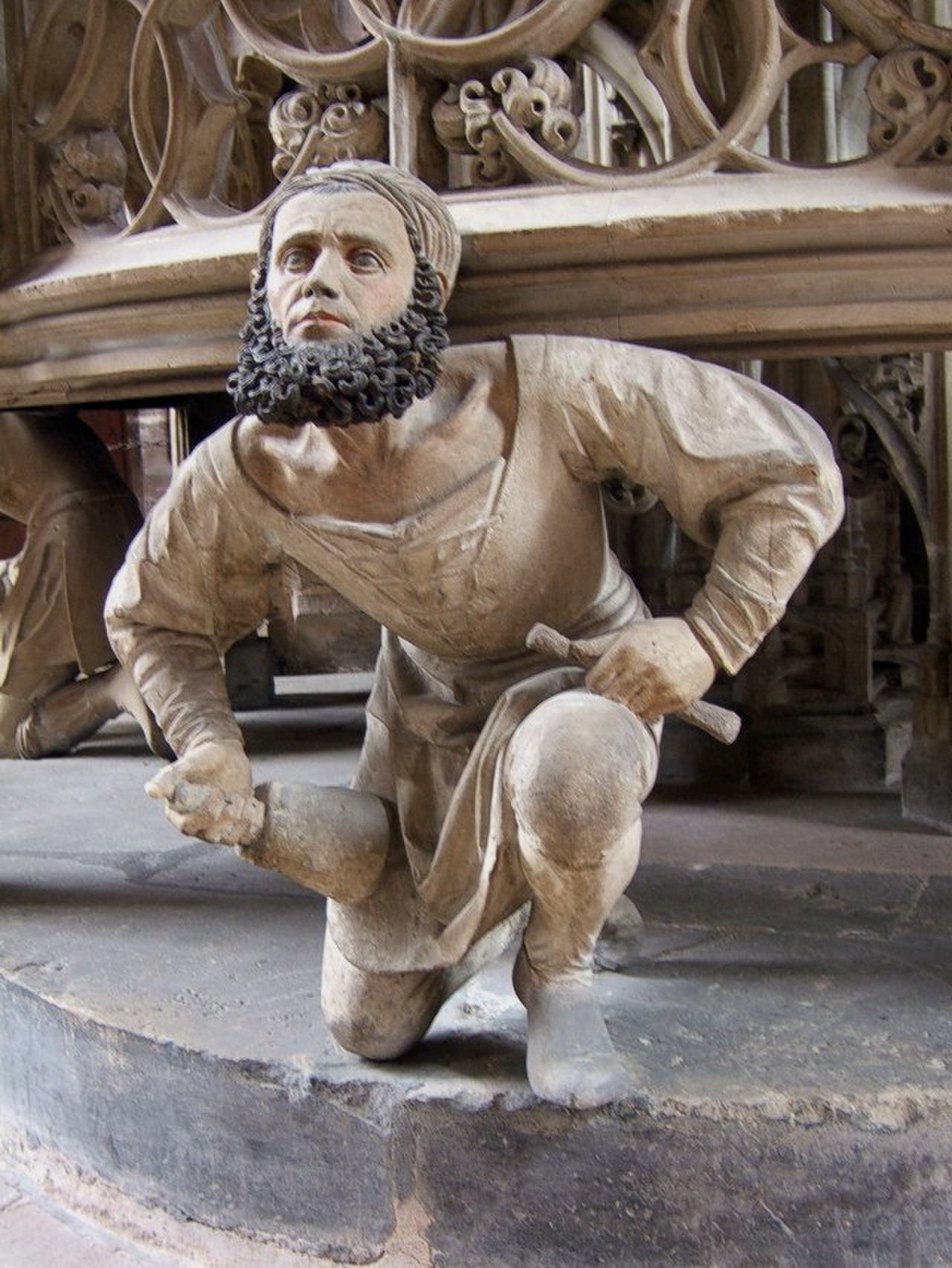 Self portrait of the sculptor Adam Kraft (1490s) at his own masterpiece - the tabernacle at the St. Lorenz Church in Nuremberg, Germany.jpg