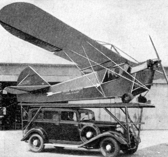 When alarm comes in, Oregon state police pursue fugitive criminals in this small plane, which takes off from plat-form mounted on top of a touring car as shown above.jpg