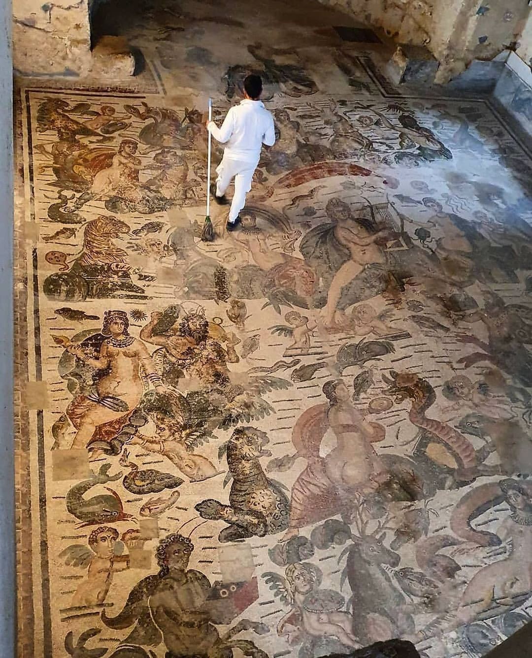 A large Roman mosaic depicting the Greek legend of Arion, who was a famous poet of Corinth in Greece. 300 CE, located at the Villa Romana del Casale in Sicily.jpg