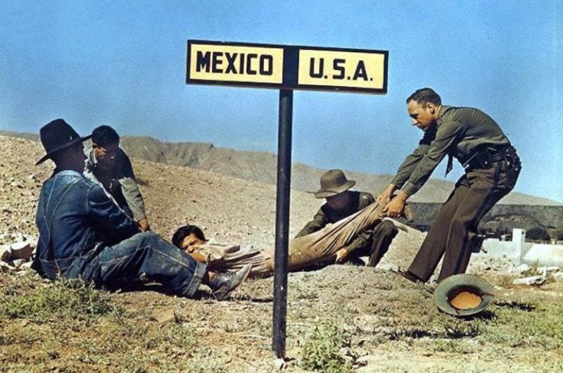 Border guards are trying to drag the criminal to their side,and his accomplices are trying to save him and drag him to Mexico, 50s-60s.jpg