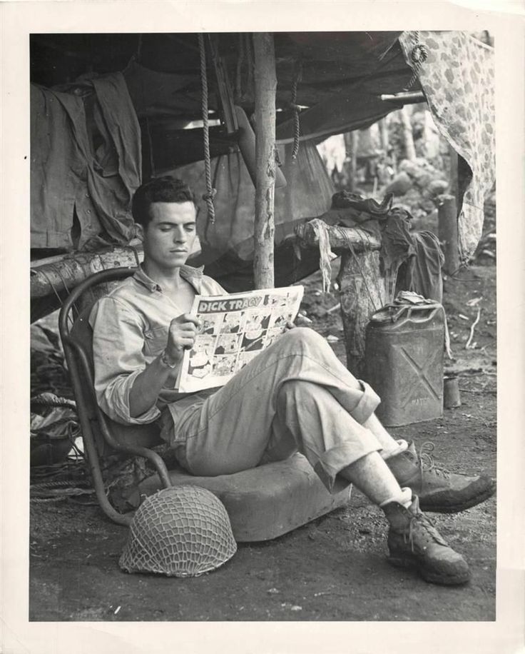 1944- U.S. Marine reading Dick Tracy comic on Cape Gloucester.jpg