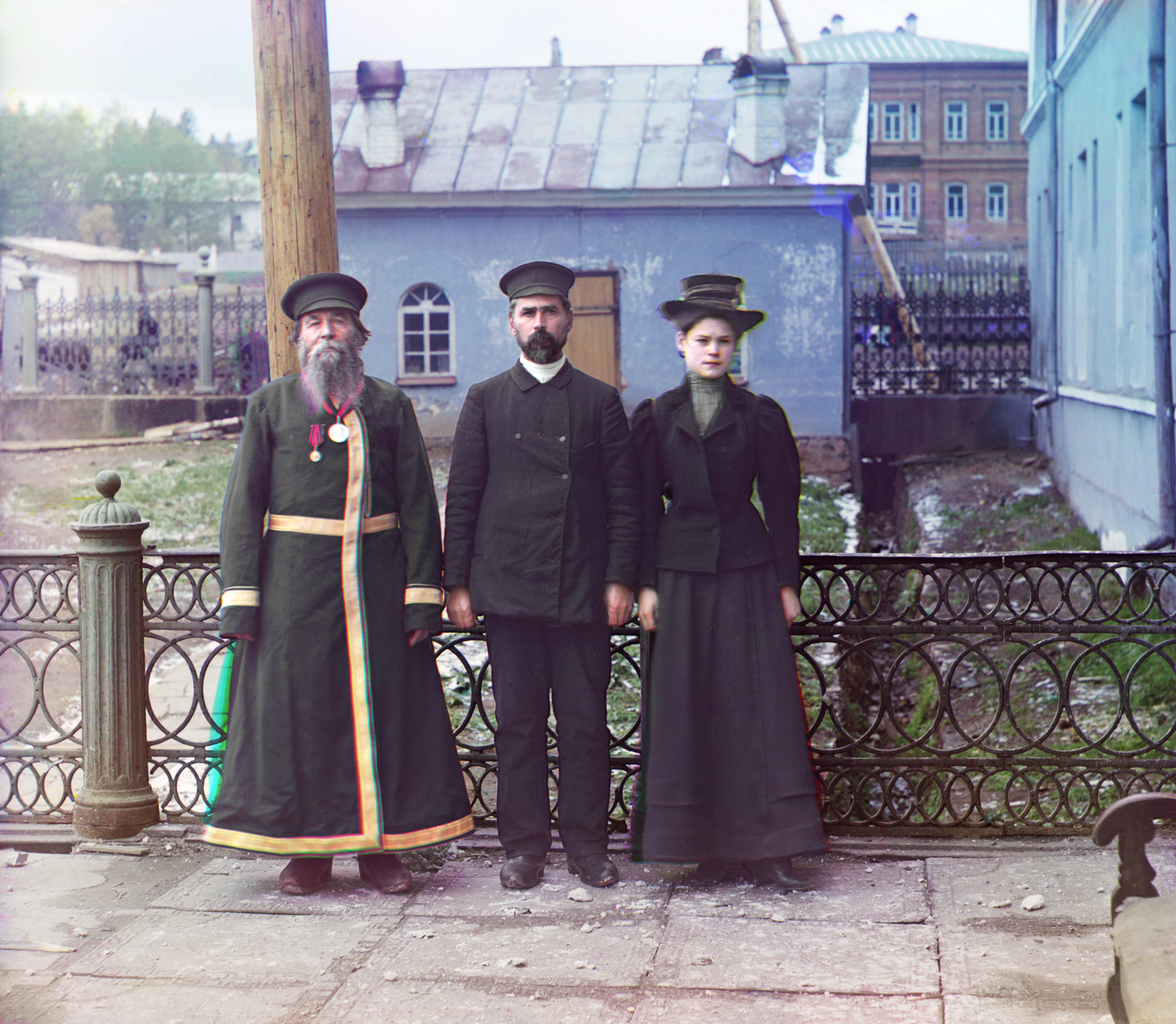 Piotr Kalganov posing with his son Igor and granddaughter Irina in the town of Zlatoust in the Ural Mountain region of Russia. 1910.jpg