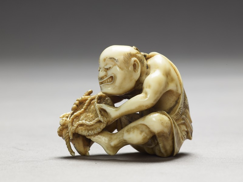 Netsuke in the form of a man making a mat. Japan, Edo period, 1780-1820.jpg