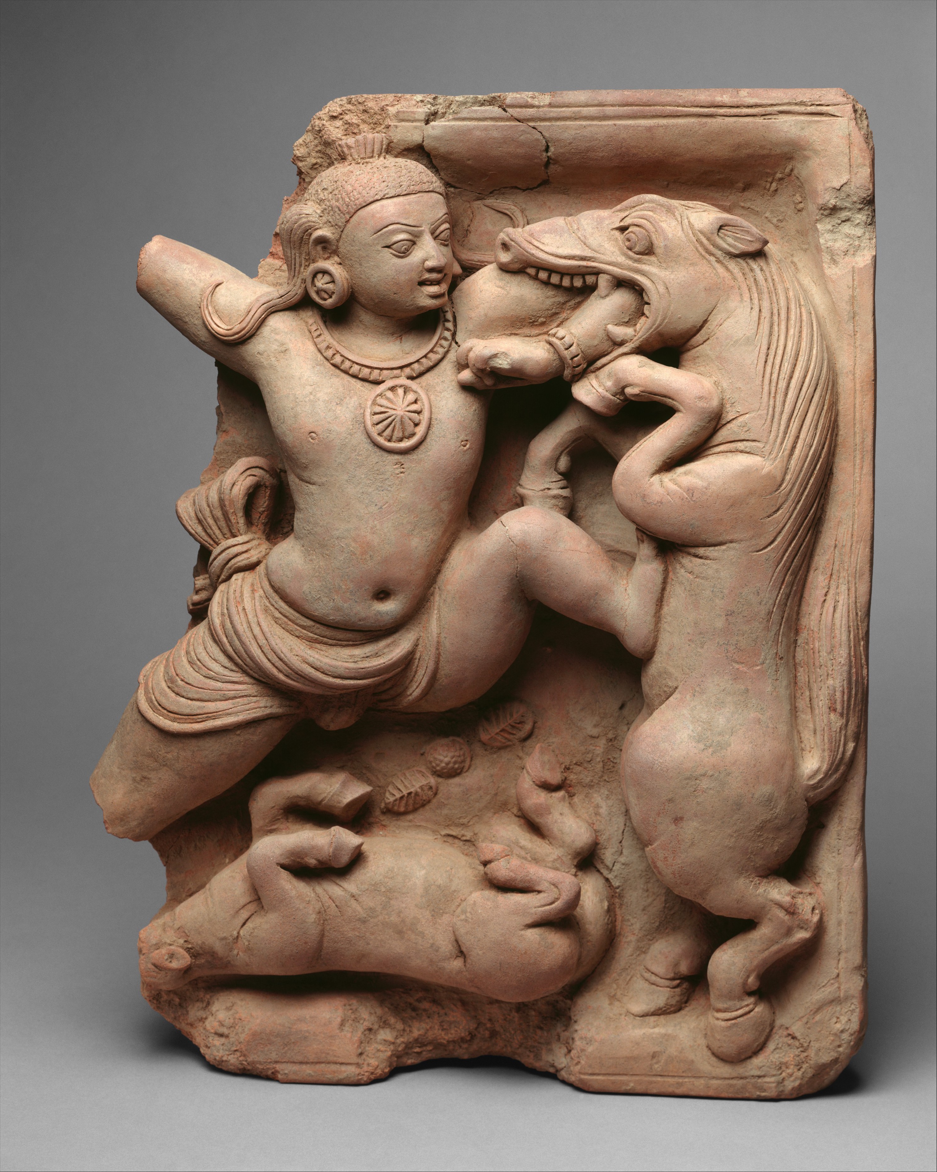 Terracotta panel of Child Krishna subduing the horse-demon Keshi.jpg