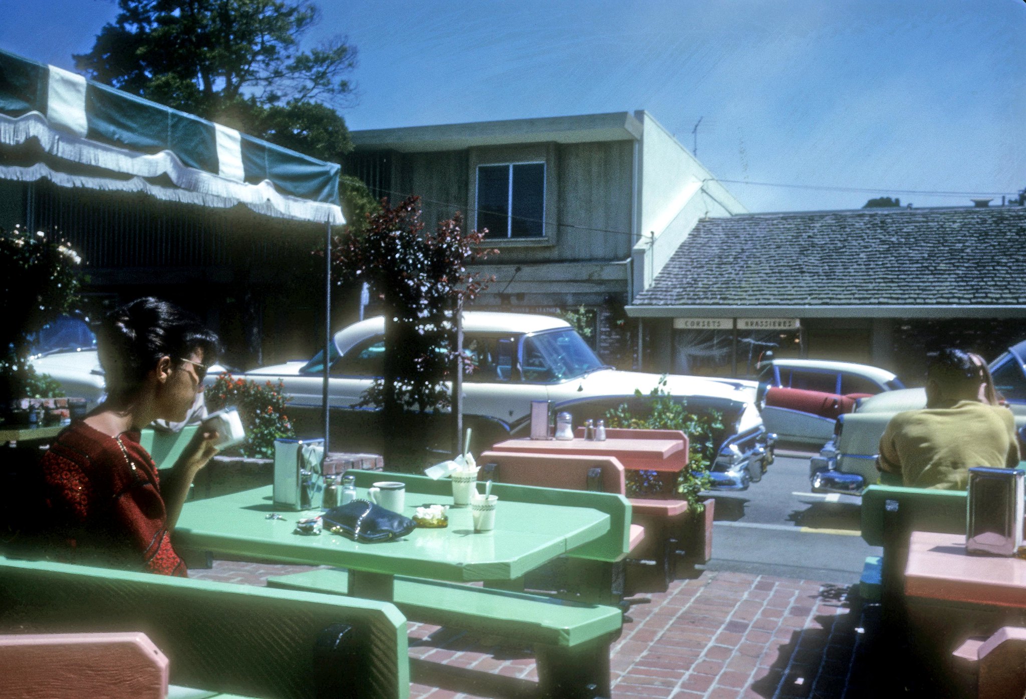 A sunny day at an outdoor cafe. c1962.jpg