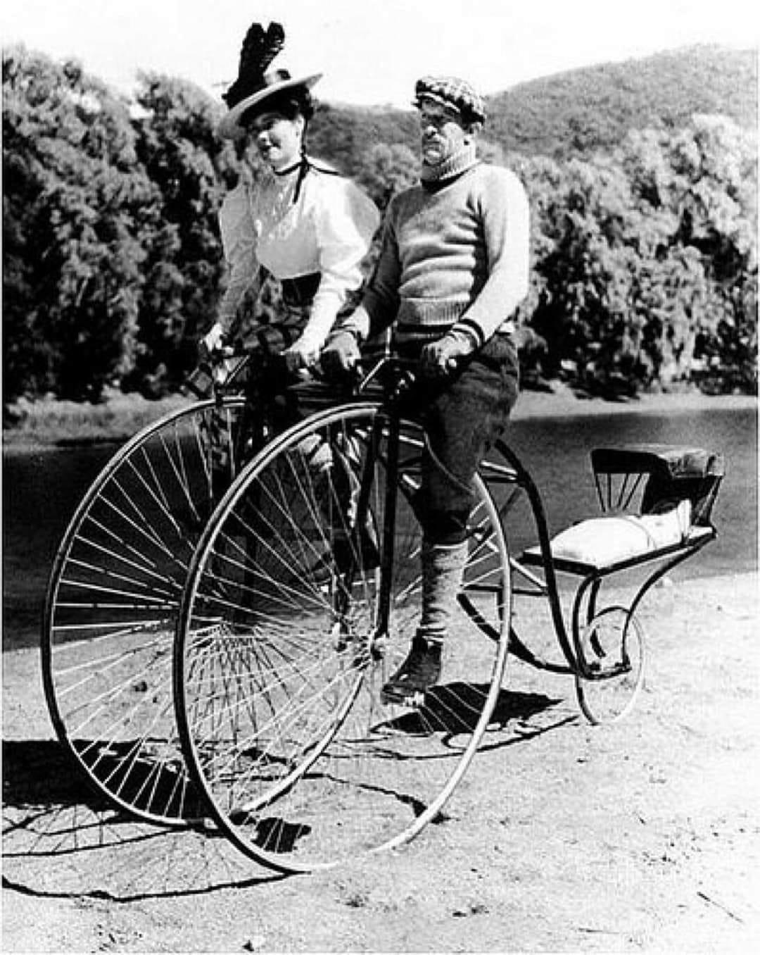 Double Bicycle with a baby carrier in 1910.jpg