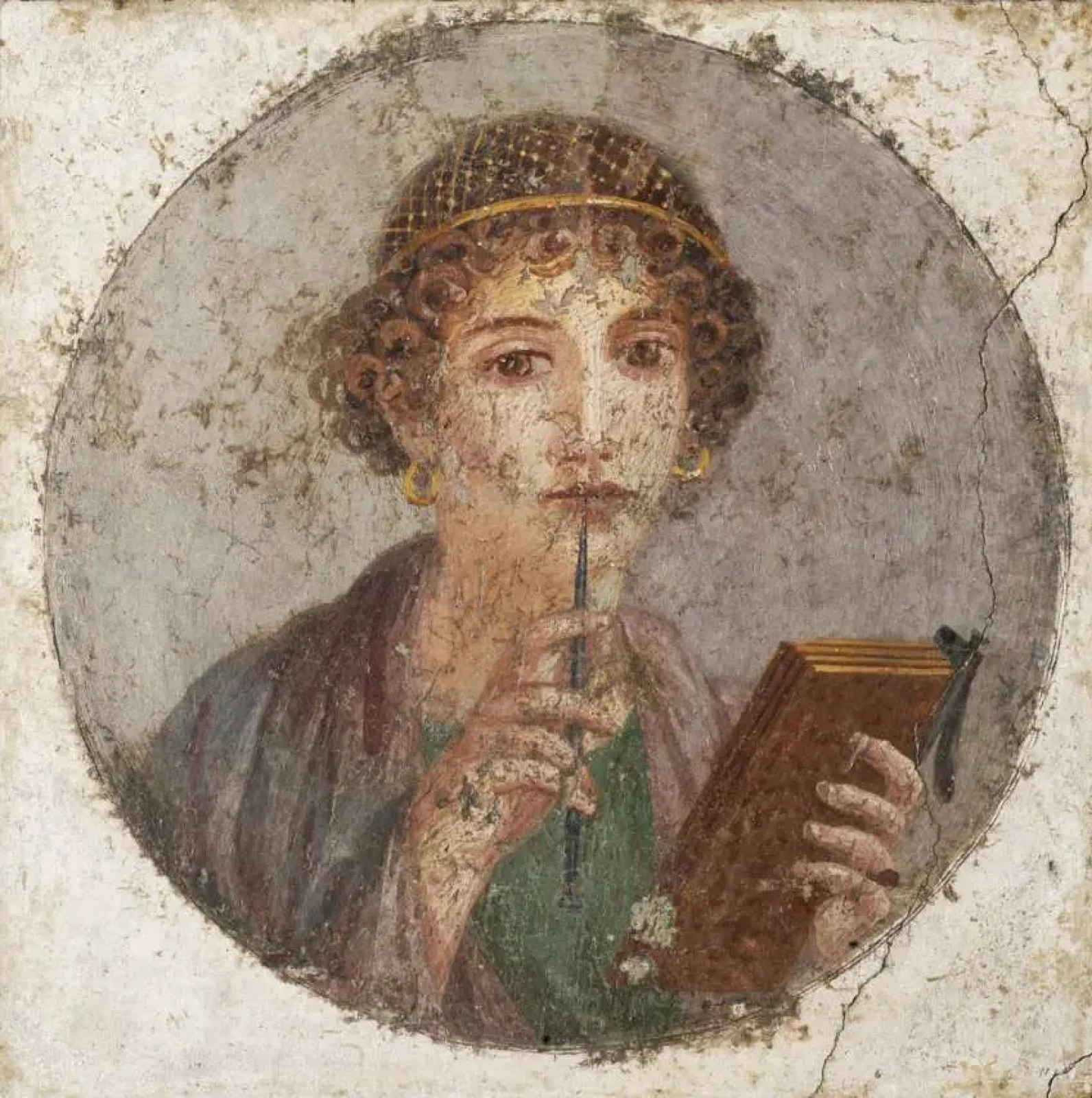 A fresco depicting the head of a girl, from Herculaneum, Italy (c. 50 AD).jpg