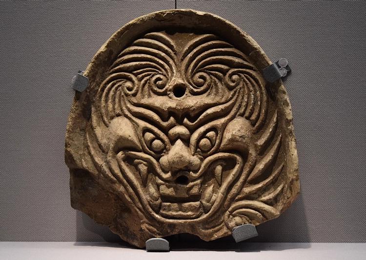 A ridge-end roof tile in the form of a demon face, Nakayama kiln, Nara, Japan. (710-794). Tokyo National Museum.jpg