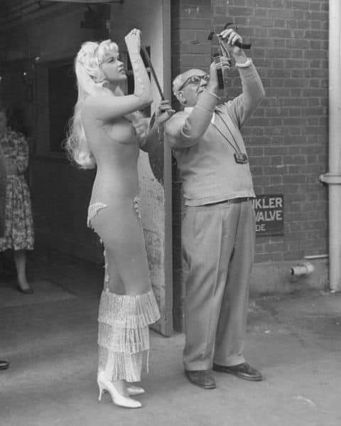 Jayne Mansfield fought her first battle against film censorship in 1961, when her movie Too Hot to Handle had a delayed release due to a scandalous mesh dress she wore in it that made her appear nude.jpg