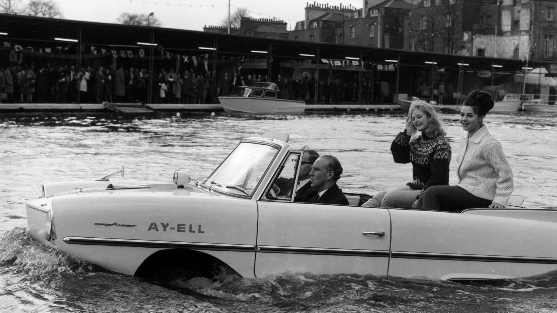 UK-Transport-Minister-Ernest-Marples-and-some-eye-candy-travelling-in-the-Triumph-powered-German-Amphicar-at-Little-Venice-on-the-Regents-Canal-London.-April-1964.jpg
