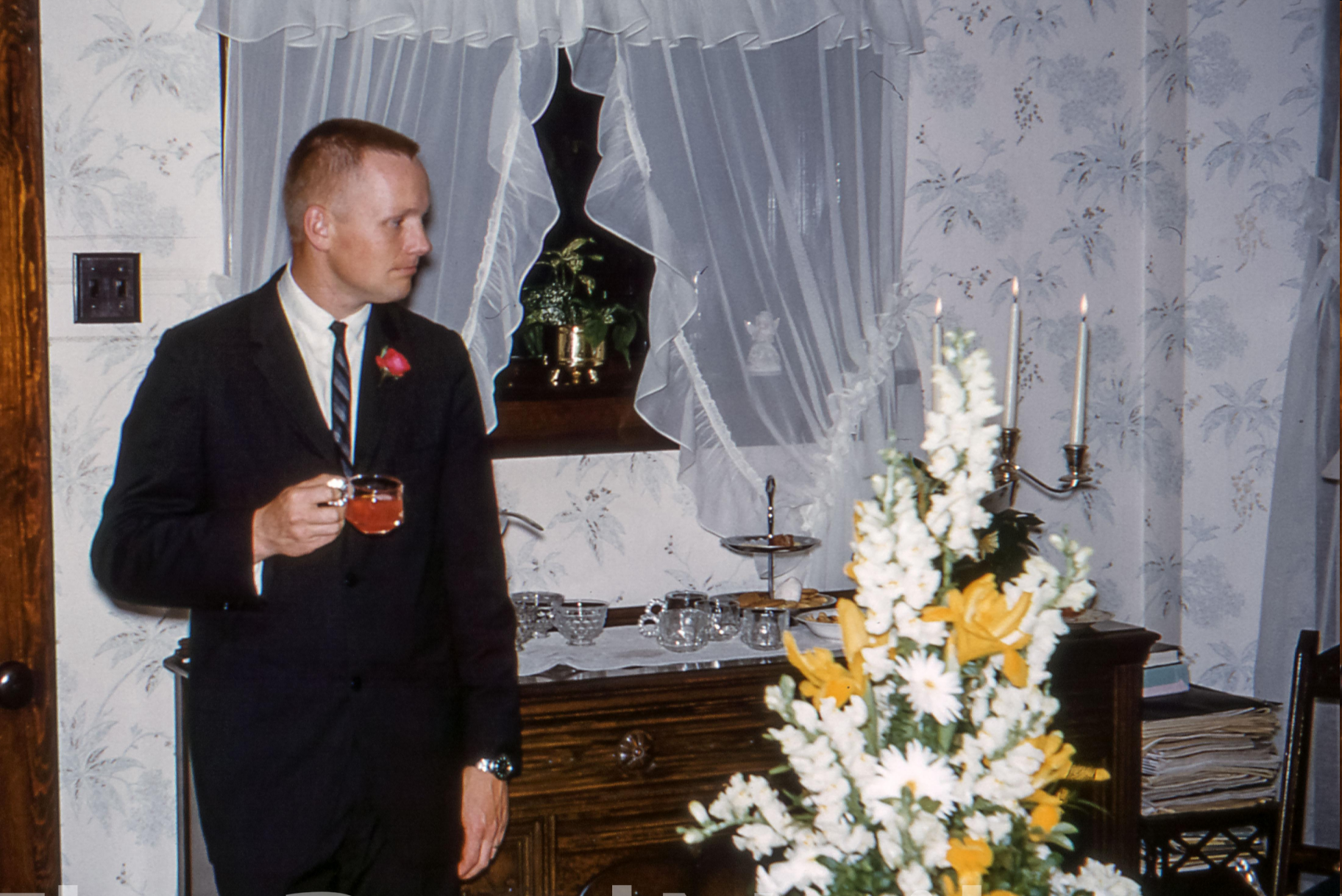 Neil Armstrong's mother snapped a photo of him standing alone at his homecoming from Gemini 8 (1966).png