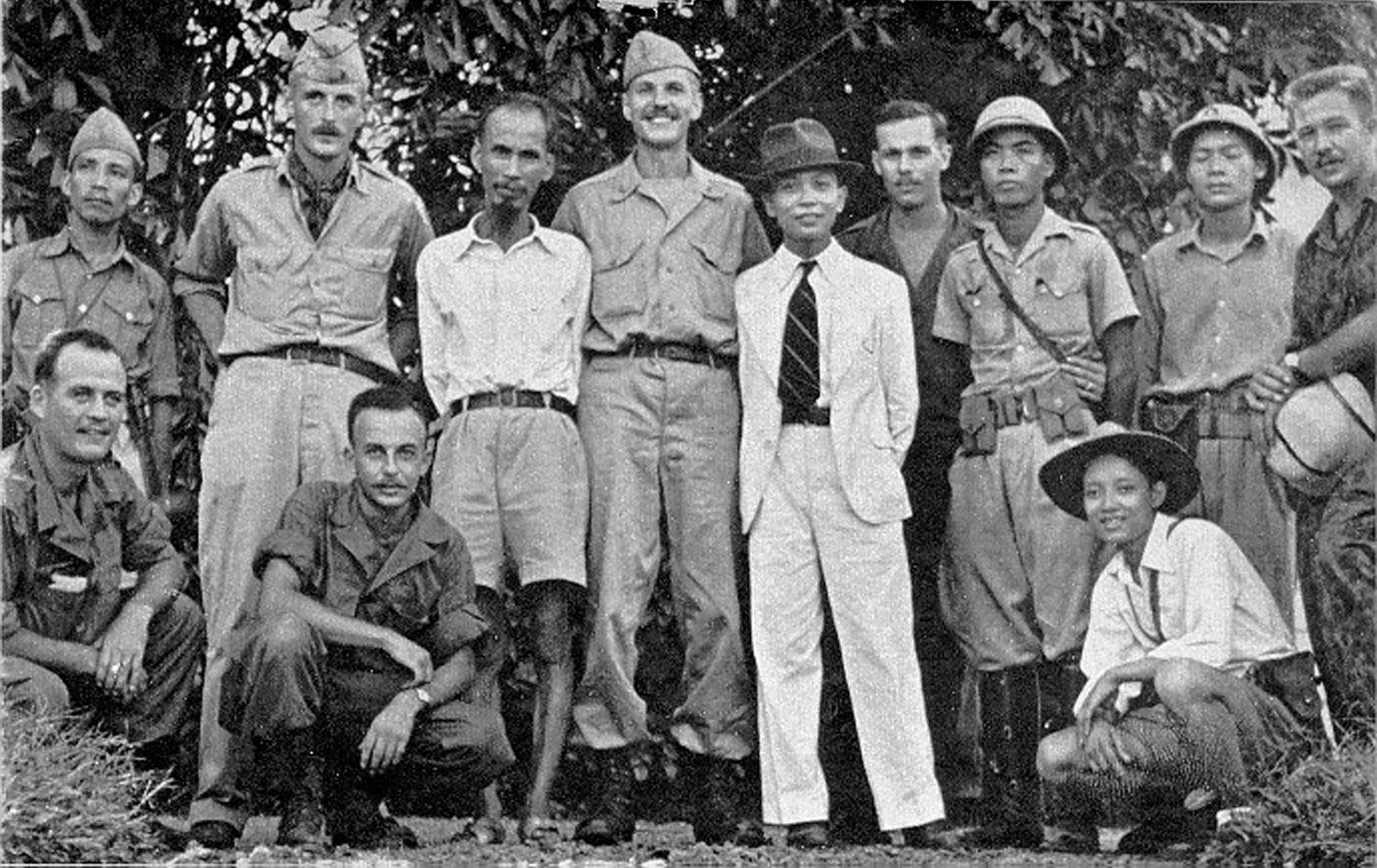 US officers in Vietnam in 1945 with their ally against the Japanese, Ho Chi Minh. Ho later thanked the Americans telling them 'You are welcome to come back at any time'.jpg