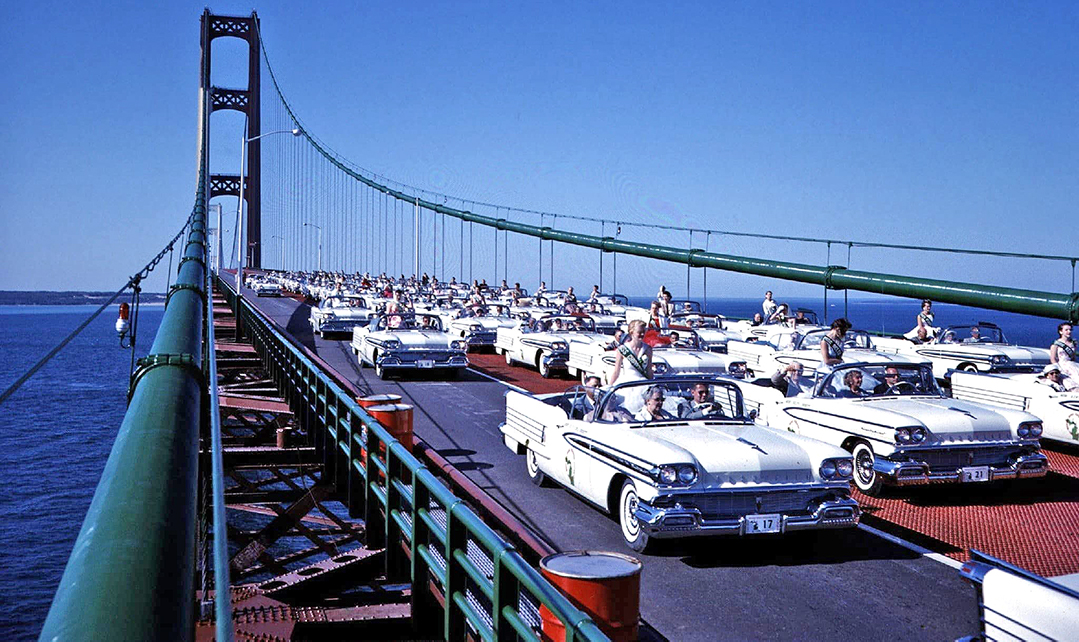 The dedication of the Mackinac Bridge in June, 1958. There was a white 1958 Oldsmobile and beauty queen representing every county in Michigan.jpg