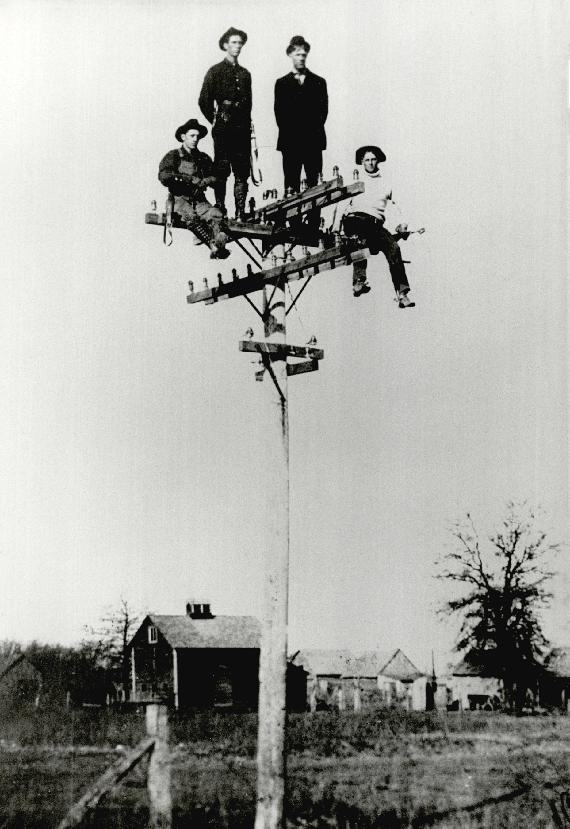 1906. Line workers in Perkins, Oklahoma install the first telephone system in Payne county.jpg