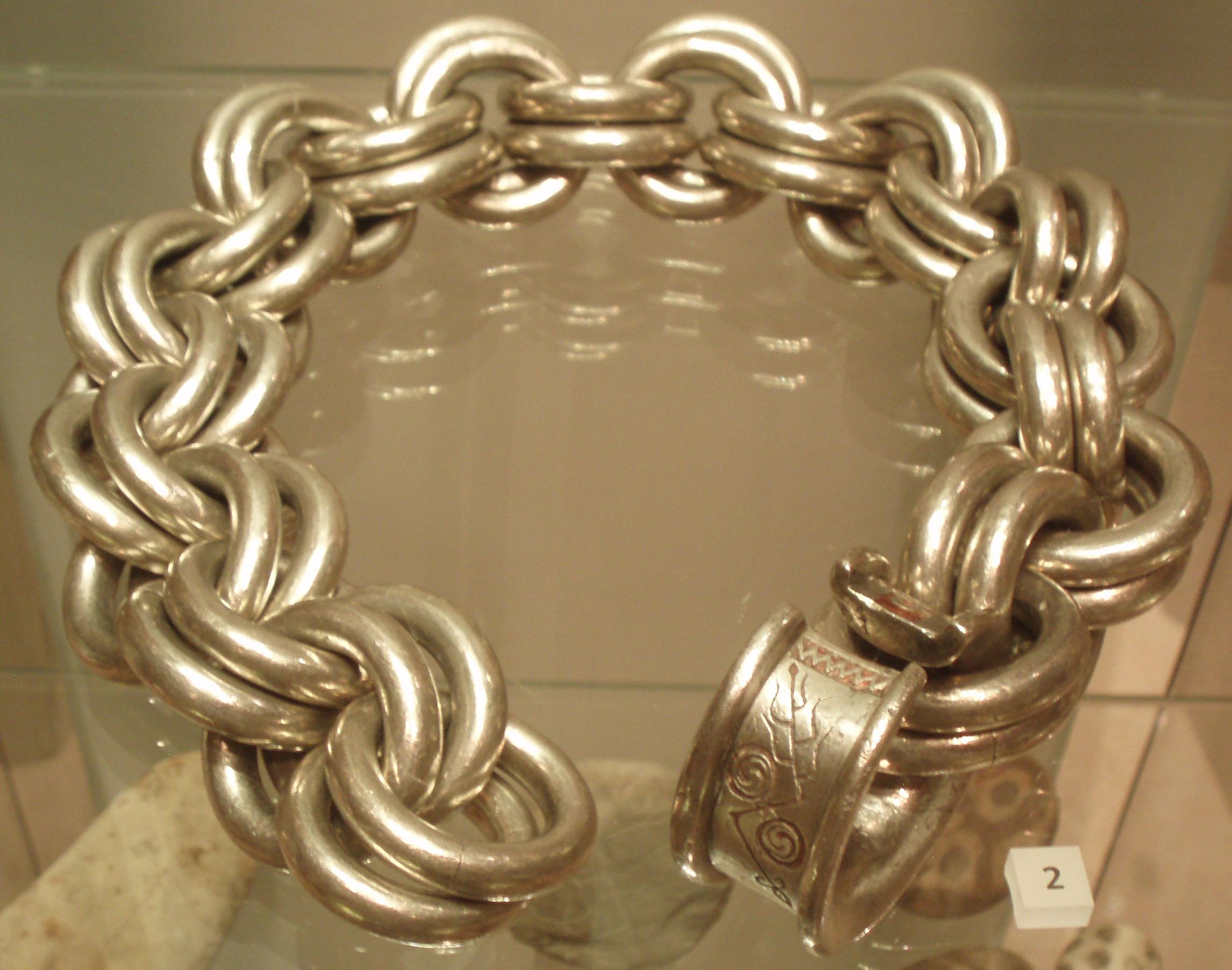 The Whitecleuch Chain is a large Pictish silver chain found in Whitecleuch, Scotland in 1869. Likely a choker neck ornament. 400-800 CE, now on display at the Museum of Scotland.jpg
