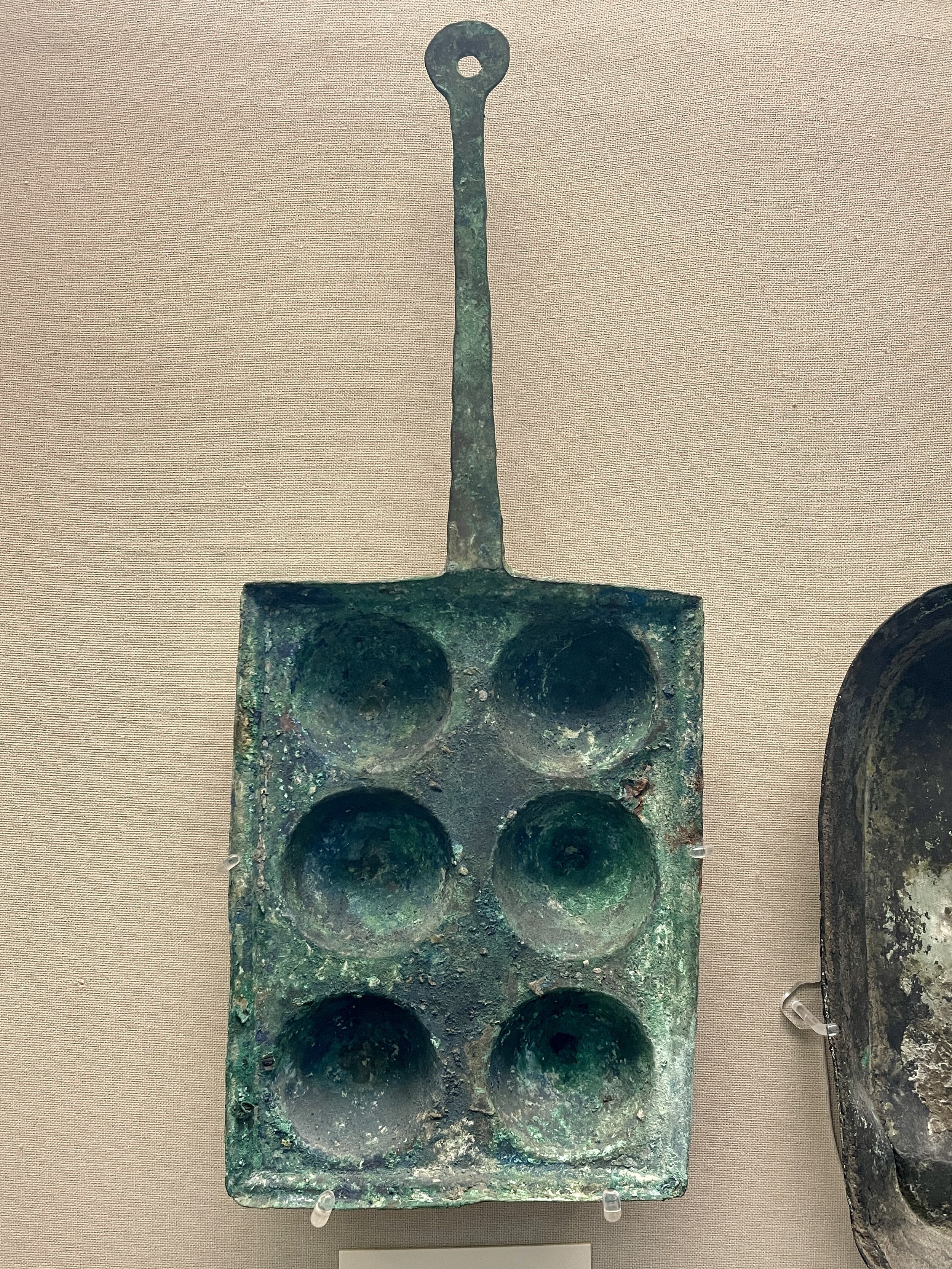 A Roman bronze baking pan for cakes or buns. 1st century AD, from Torre Annunziata in the Bay of Naples.jpg