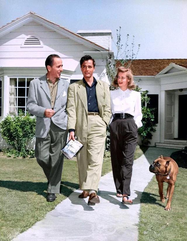 Bogie & Bacall with a young John Derek (future husband of Bo Derek) circa 1948.jpg