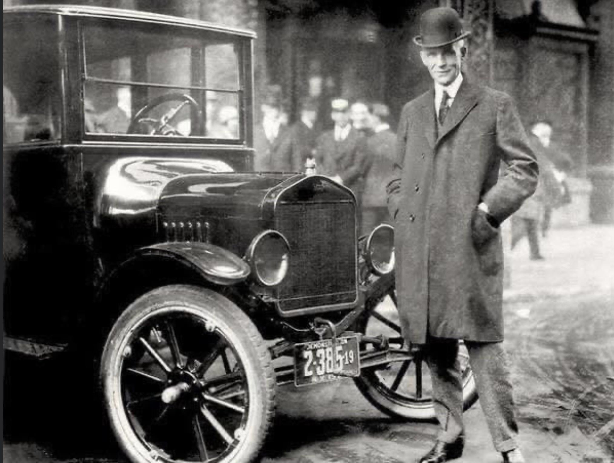 Henry Ford & his 1921 Model T.jpg