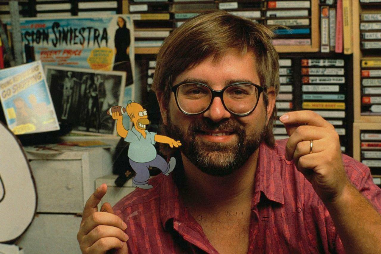 Matt Groening in 1990 with a cel of Homer Simpson.jpg