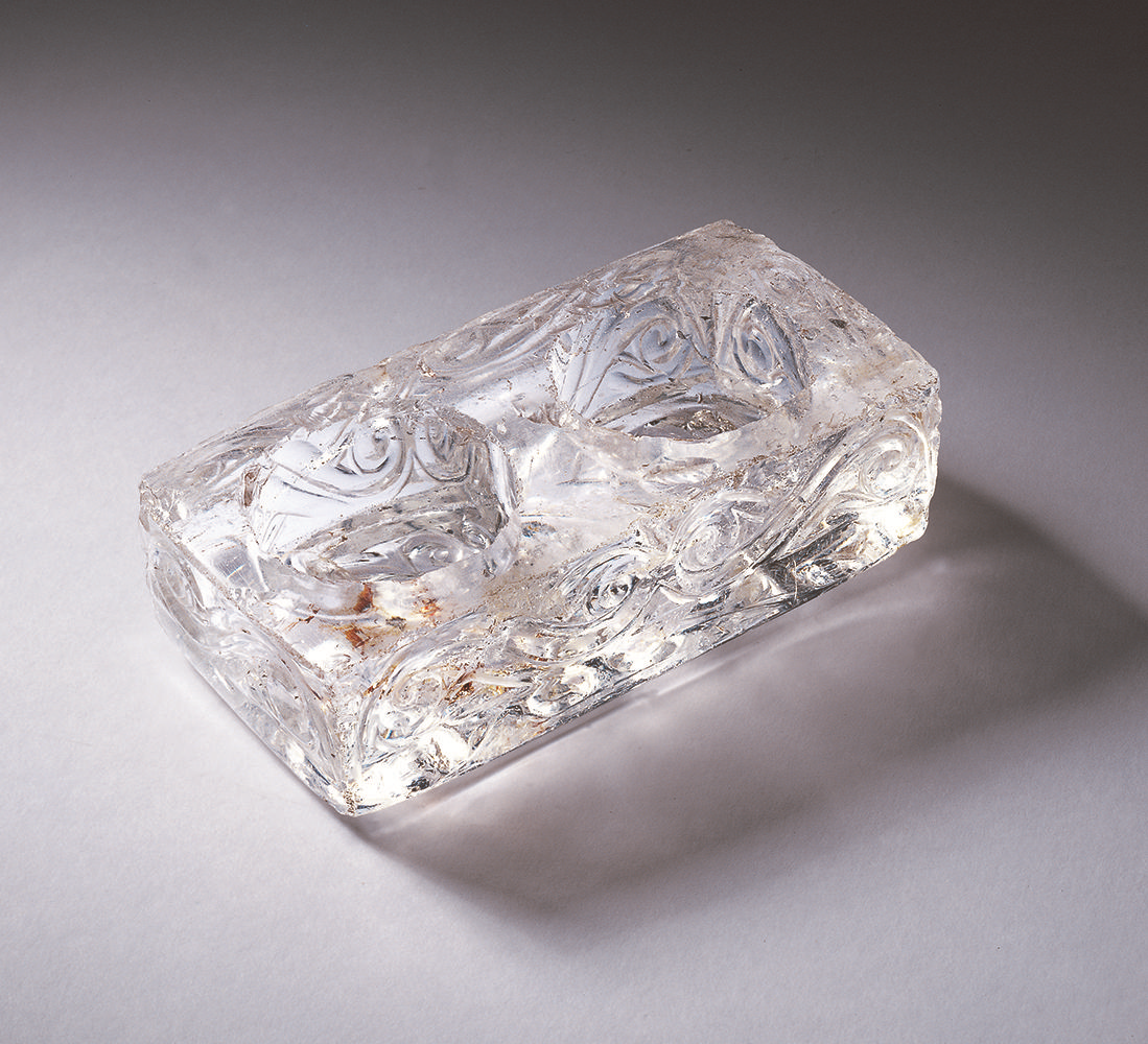 Painter's palette carved from rock crystal. Iraq, Abbasid Caliphate, 10th century AD.png