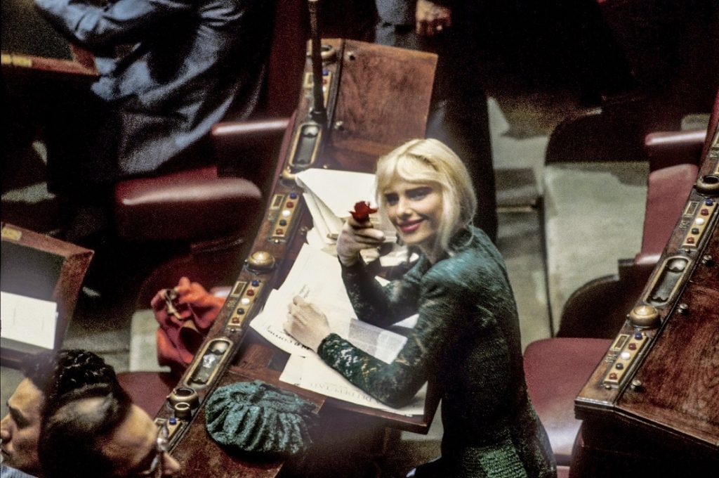 Adult film star Ilona Staller at her seat in the Italian parliament in 1987.jpg