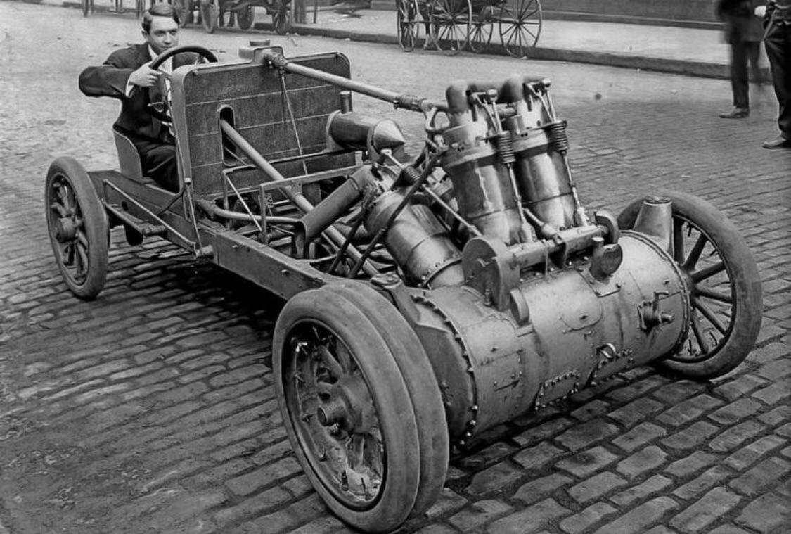 John Christie in the car he invented and assembled, 1907.jpg