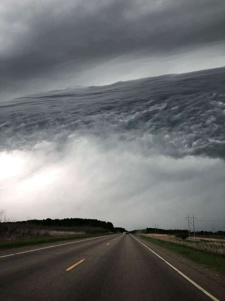 A Minnesota woman recently captured a cloud formation that appeared to look like an ocean in the sky.jpg