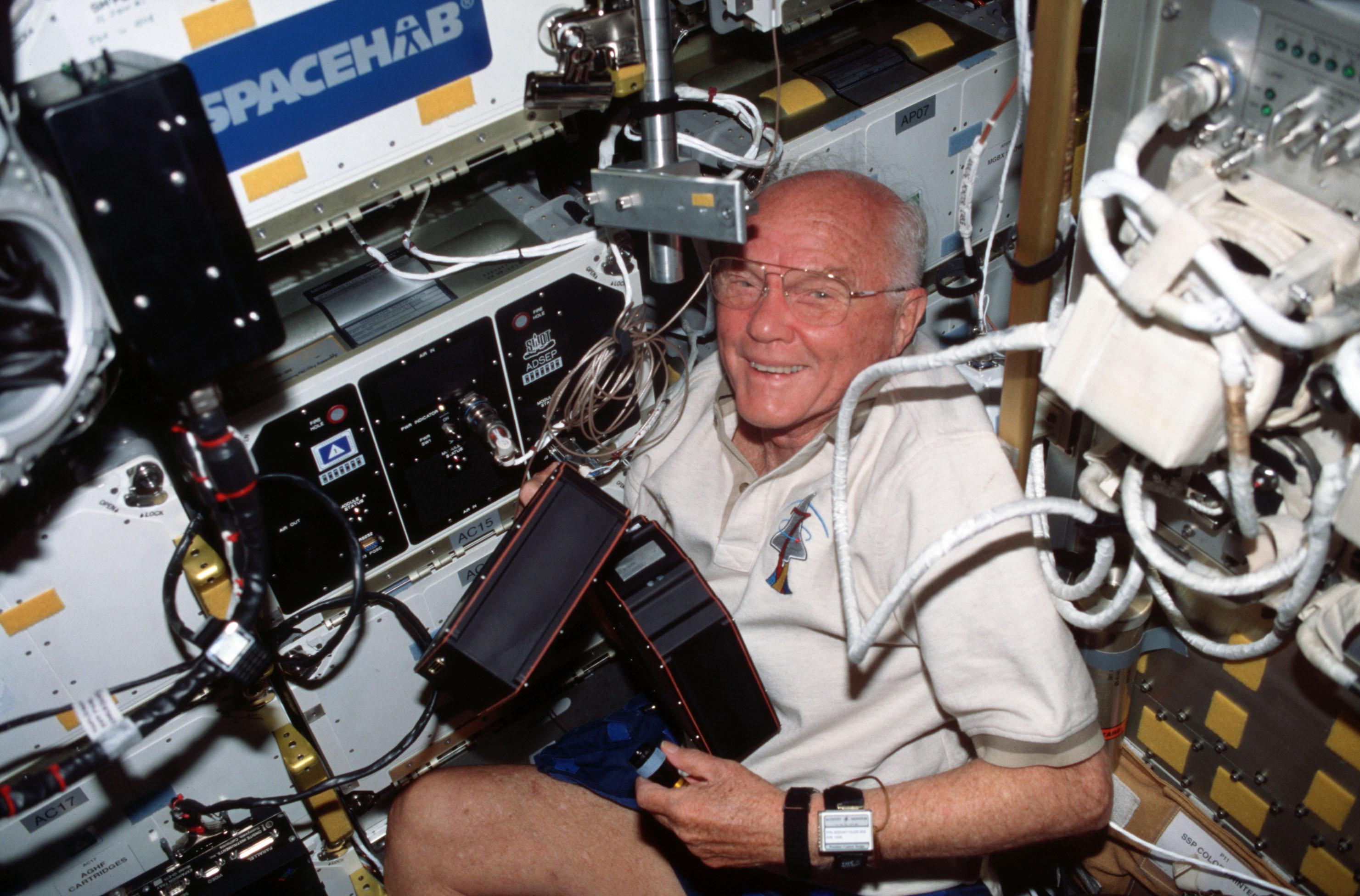 Former astronaut John Glenn aboard the space shuttle Discovery in 1998. This flight has made him the oldest man to be in orbit.jpg